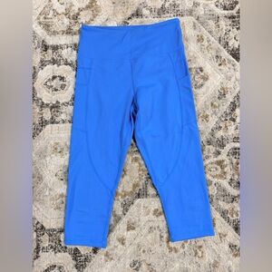 Zyia blue pocket light n tight crop 17” inseam legging